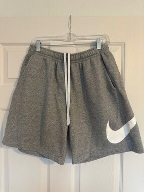 Men’s Nike Light Gray Fleece Shorts with White Swoosh Tag, 3 Pockets